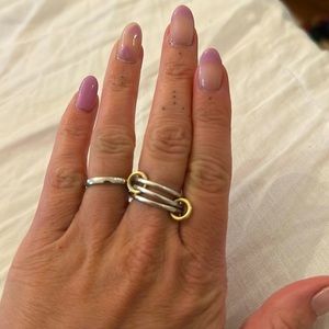 Spinelli Killcolin solarium ring. Small Rings are yellow gold.